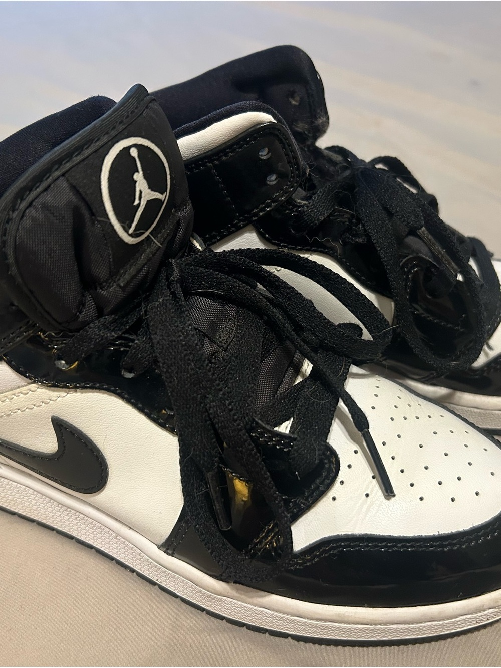 Jordan Kids Black and White High-Top Sneakers